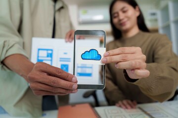 Cloud Technology in UI UX Design. Team showcasing mobile app features.