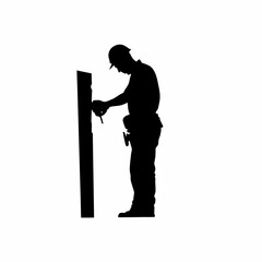 Silhouette of a construction worker fixing tiles in a new house isolated on white background