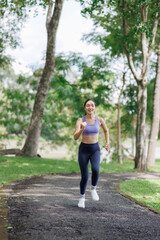 Fototapeta premium Young asian woman jogging for fitness and health