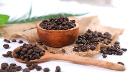 Aromatic Coffee Beans Displayed in Wooden Bowl and Spoon