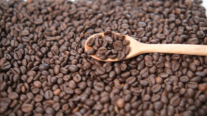 Roasted Coffee Beans with Wooden Spoon