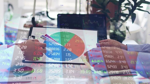 Traders analyzing and studying stock market financial statements