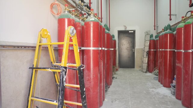 The fire protection room for a data center or server room, filled with tanks of clean agent gas, designed to extinguish a fire without damaging sensitive electronic equipment.