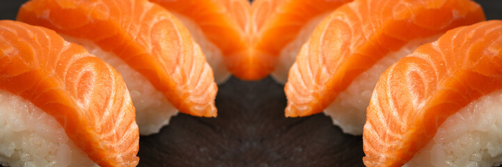 Slices of Raw Salmon Fillet on Black Background Mockup Top View
