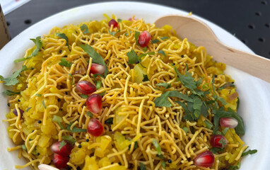 Poha Indian breakfast food. Healthy pohe rice flakes dish
