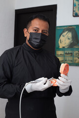 portrait of a dentist in his office