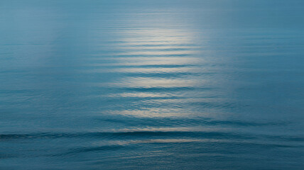 Obraz premium Natural Ocean Background with Shimmering Water Surface