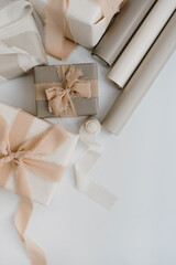 Gift box packaging concept. Holiday celebration composition. Elegant decorated Christmas, New Year gifts. Flat lay, top view
