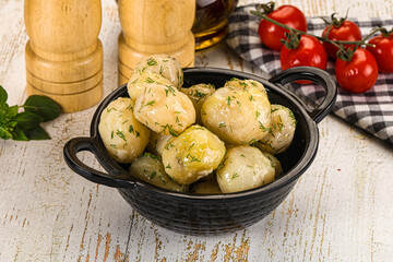 Young boiled mini potato with dill
