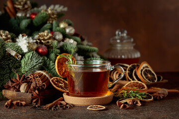 Christmas herbal tea with cinnamon, anise, and slices of dry citrus.