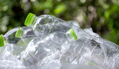 plastic waste, clear bottles in a trash bag, reflecting the plastic waste issue, represents recycling, waste separation, its environmental impact, plastic recycling