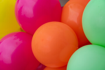 colorful balloons in a garland, festive background