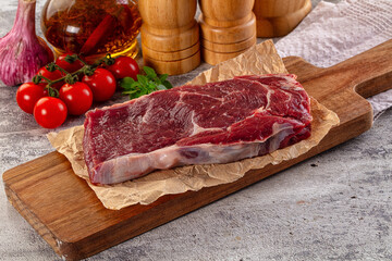 Gourmet raw rib eye steak
