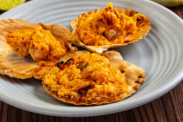 Luxury baked scallops with cheese