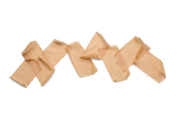 Strips of brown masking tape on white background