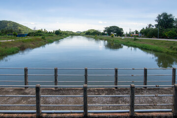 A full irrigation canal ready to supply water to agricultural areas.