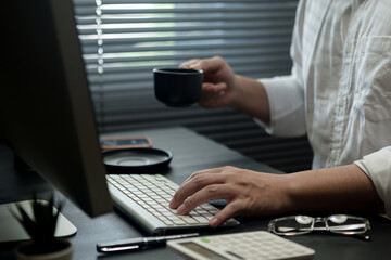 Businessman is sitting at his desk working