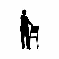 Silhouette of a teacher arranging classroom chairs before lesson isolated on white background