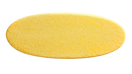 Bright yellow oval object with a highly textured porous and bubbly surface resembling a household sponge