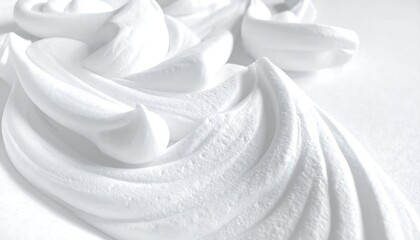 Close-up of white swirls, resembling a decorative dessert topping
