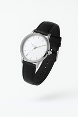 Floating wristwatch with black leather strap and white dial isolated on clean background, elegant modern watch product photo for branding or advertising, minimal design, silver metal case