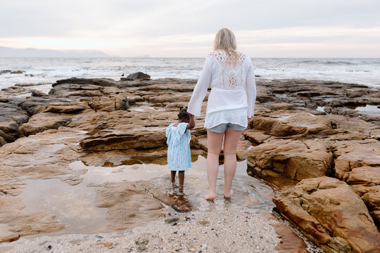 Diverse family on the Beach at sunrise