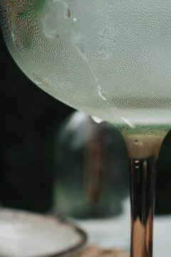 close up of condensation on a cocktail glass outdoors