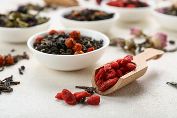 Different fruit tea on light background