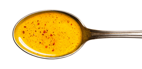 isolated spoon with curry sauce