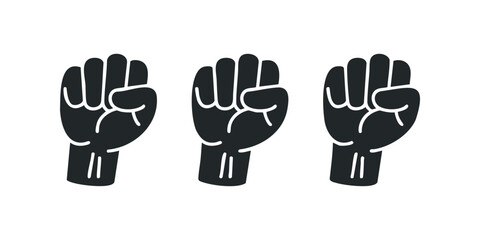 Fototapeta premium Three Raised Fists Symbolizing Unity and Strength
