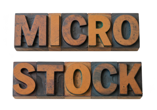 Vintage wooden letterpress type forms spell micro stock photography business concept isolated on transparent background