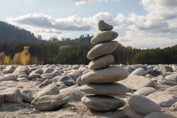 Stacked Stones on Riverbank