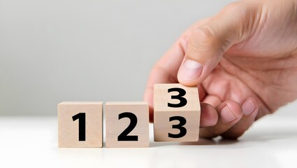 hand holding a word 1, 2 , 3 