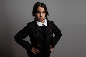 a girl Wednesday Addams. Halloween party