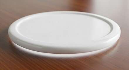 Sleek white plate on a smooth wooden surface for food or product placement