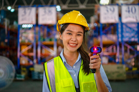 Blue collar worker is working at warehouse.