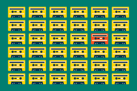 Pattern of yellow cassette tapes with one red alternative on green background