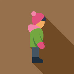 Kid wearing warm winter clothes standing still, side view with long shadow