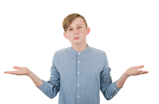 Confused guy teenager keeps hands outstretched, shrugging shoulders. Adolescent male portrait looking perplexed, balancing arms isolated on transparent background