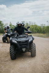 Friends enjoy an adventurous outing on quad bikes, exploring a dirt path through nature. The image conveys a sense of camaraderie, excitement, and the thrill of adventures with all-terrain vehicles.
