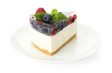 Piece of delicious cheesecake with berries and mint isolated on white