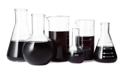 Different laboratory glassware with black liquid isolated on white