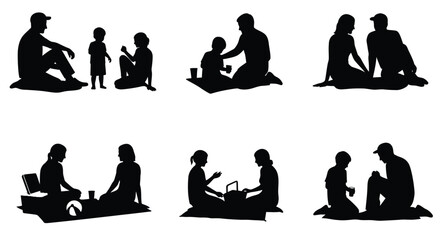 Silhouettes of families enjoying picnics together in a peaceful outdoor setting