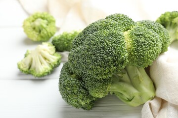 Fresh raw broccoli on light table, closeup