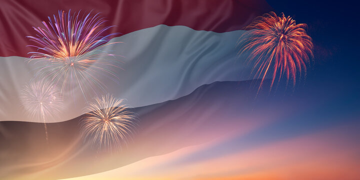 Waving National flags of Yemen In sky with fireworks and text