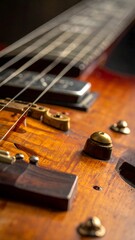 Fototapeta premium Close-up of a Vintage Handcrafted Electric Guitar with Natural Wood Grain and Brass Hardware