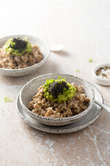 Green buckwheat with avocado and caviar