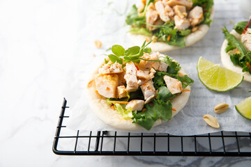 Chicken sandwiches with peanut and lime