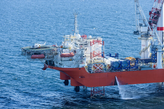 Helicoptor landing on an installation vessel in a wind farm in the Baltic Sea during a crew change..