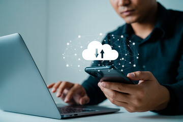 Cloud computing data transfer man using laptop and smartphone for secure file sharing backup network